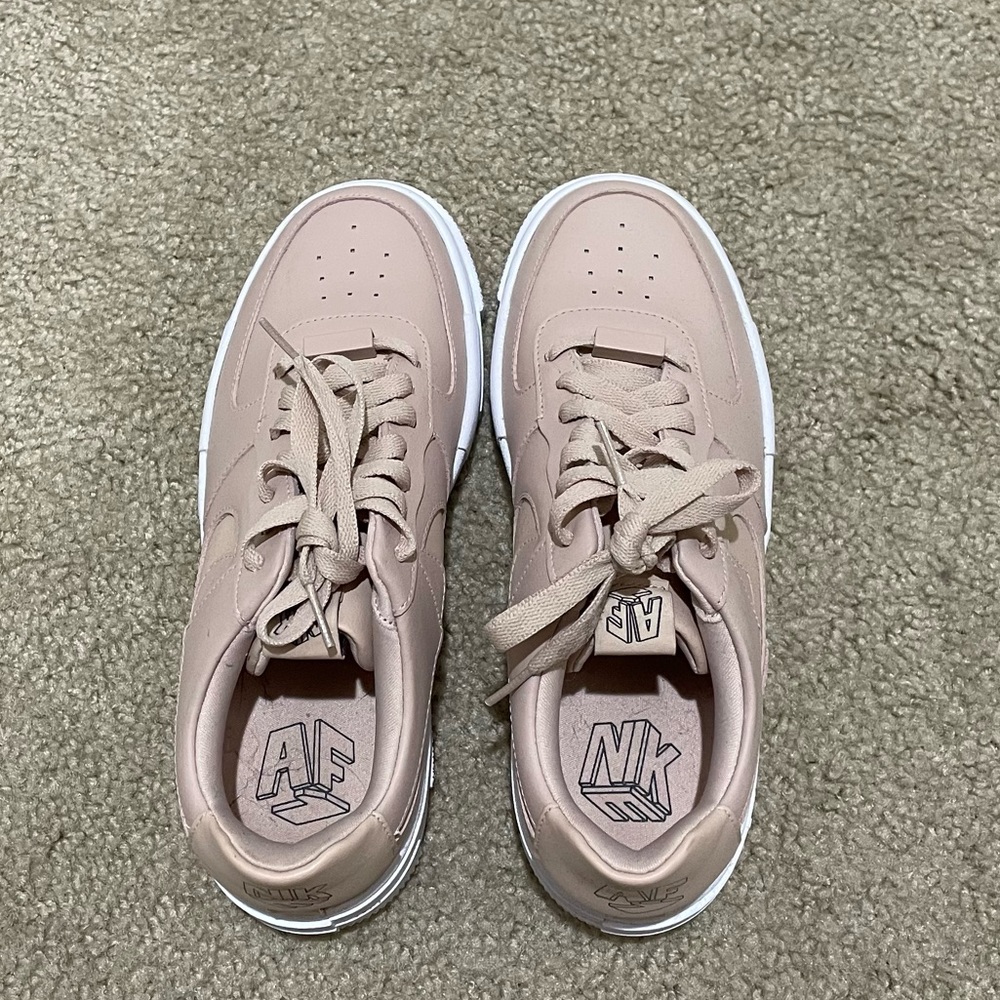 creamy pink colored Air Force Ones